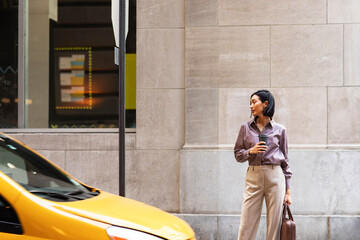 Modern Businesswoman Standing on the Street