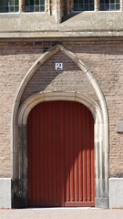 Fototapeta na wymiar Entrance church door neogothic style