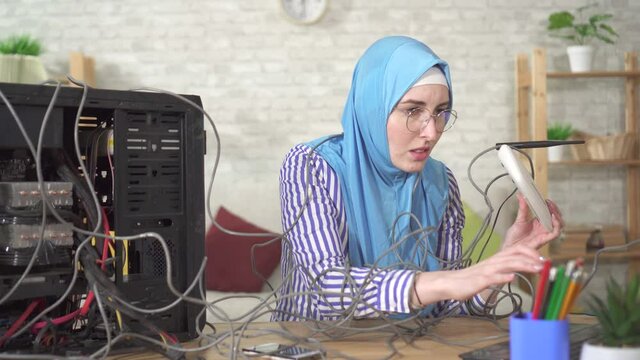 Upset muslim woman because of the poor reception of Internet