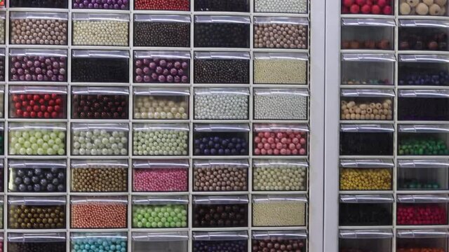 Background with colorful shiny beads. High quality 4k footage