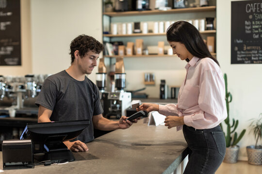 Brunette woman drinking coffee in her morning break