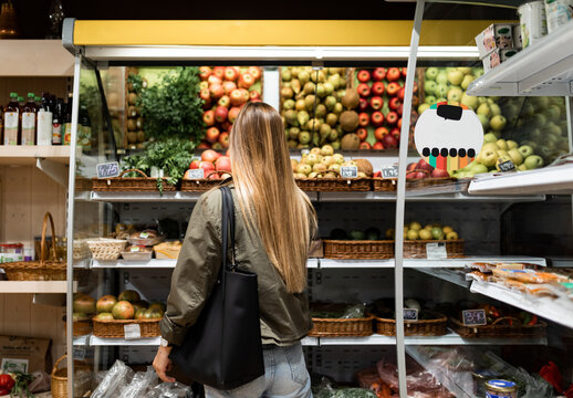Woman making purchase in an ecological store