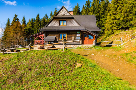 Sidzina, Poland - May 16, 2020: Mountain hut PTTK (Polish Tourist and Sightseeing Society) named after Kazimierz Sosnowski at Hala Krupowa, in the Zywiec Beskids.