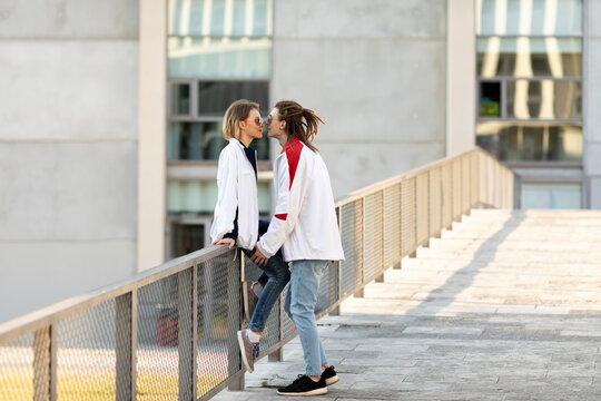 young couple spends time on electric scooter