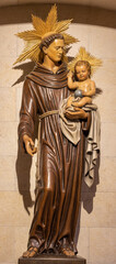 VIENNA, AUSTIRA - OCTOBER 22, 2020:  The carved polychrome statue of St. Anthony of Padua in church...