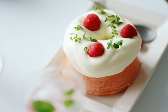 Home made pink strawberry cake, on the table.