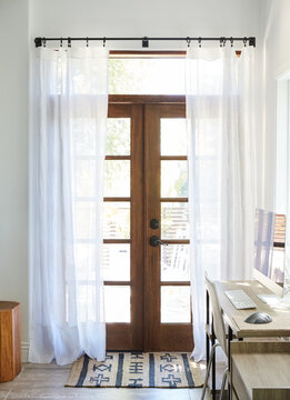 Entry doorway with curtains