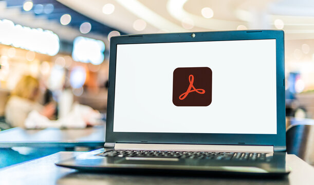 Laptop computer displaying logo of Adobe Acrobat Professional