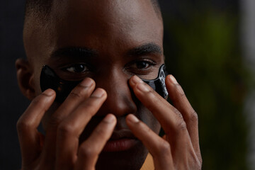 Young man after party skincare