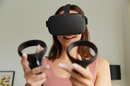 Woman having fun with VR games