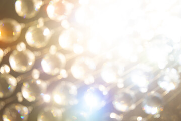 Golden elegant abstract background with bokeh lights texture