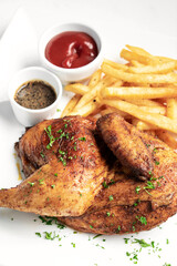 roast rotisserie half chicken with french fries simple meal