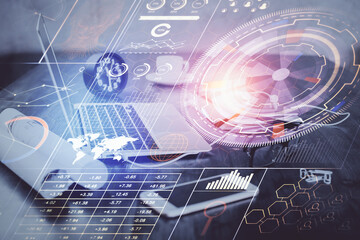 Double exposure of table with computer on background and data theme drawing. Concept of innovation.