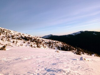 winter landscape in the mountains at dawn