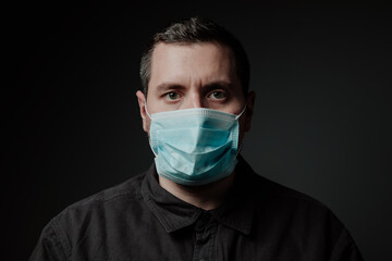 a man wearing a medical mask
