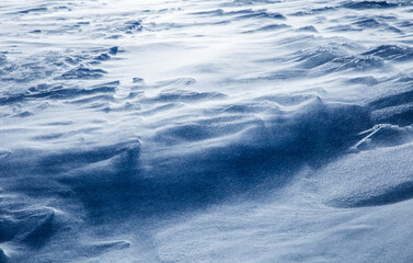 Abstract formations from snow and ice in heavy winter during blizzard. 