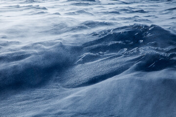 Fototapeta premium Abstract formations from snow and ice in heavy winter during blizzard. 