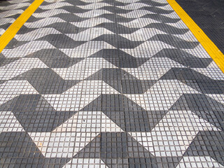 parking space with tiles in the shape of the State of São Paulo