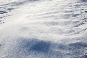 Abstract formations from snow and ice in heavy winter during blizzard. 