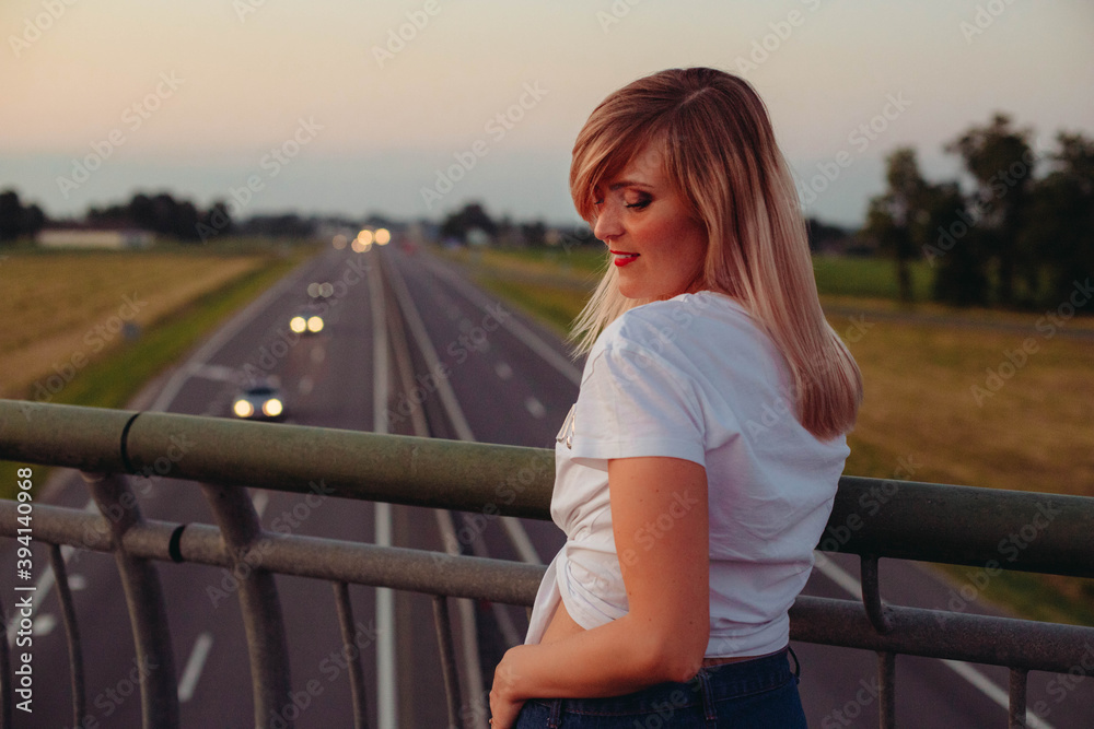 Wall mural woman on the bridge