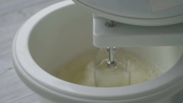 whipping egg white with a mixer time lapse