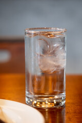 Glass of water on a table in a restaurant