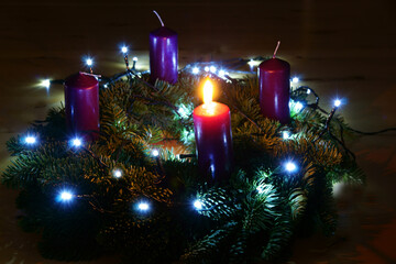 First Advent, Advent wreath with one burning candle, copy space
