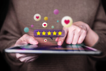 Customer Experiences Concept. Closeup of Woman Using Digital Tablet to Giving Feedback via the Internet. Positive Review. Client Satisfaction Surveys. Front View