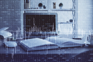 Financial chart drawing and table with computer on background. Multi exposure. Concept of international markets.