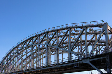 Close-up of the arched span of the railway double-track bridge