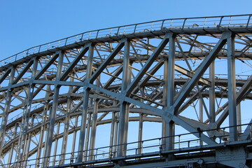 Close-up of the arched span of the railway double-track bridge