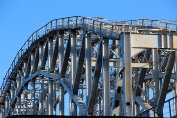 Close-up of the upper arched belt, slopes and racks of the arched span of the railway bridge