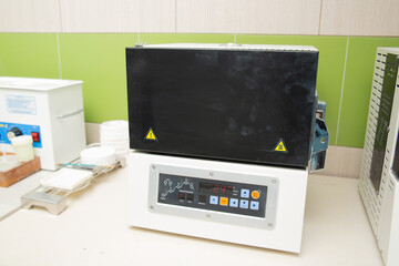 Thermal oven for dental implants in a dental clinic.