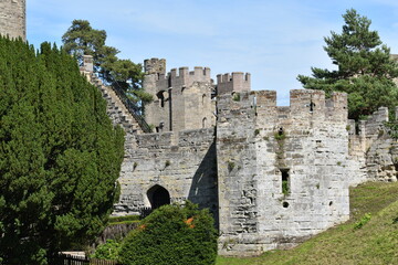 Walls and towers of Warwick Castle in summer, England, UK