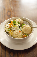 
small dumplings in broth with spices