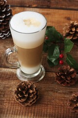Coffee latte and forest cones on the table