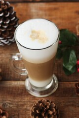 Coffee latte and forest cones on the table