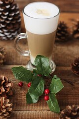 Coffee latte and forest cones on the table