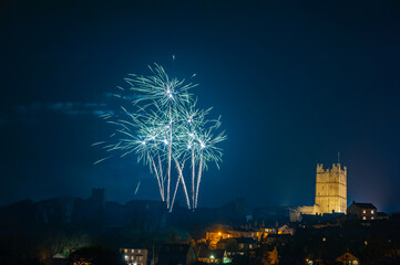 Fireworks display above Richmond Castle, North Yorkshire with houses in the foreground
