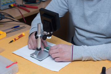 Digital microscope for repair of electronic components.