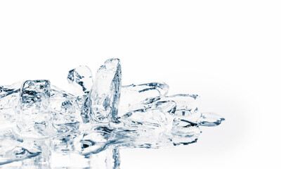 Crushed ice pieces on a mirror reflective surface.