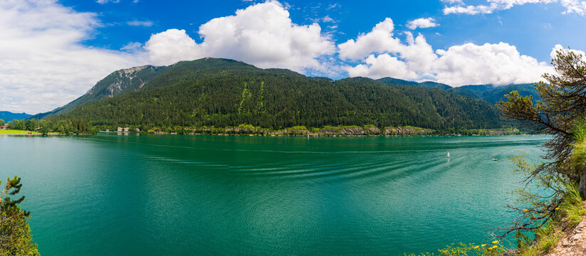 beautiful lake Achensee in summer, view to tourist health resort Pertisau and austrian alps