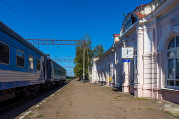 Fototapeta na wymiar The old building of the railway station in the village of Dolinskaya. Ukraine, Kirovograd Region.