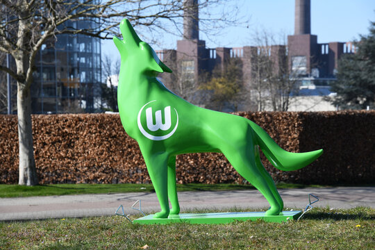 Wolfsburg, Lower Saxony / Germany - April 6, 2020: Howling wolf with the logo of German football club VfL Wolfsburg in Wolfsburg, Germany