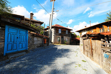 Fototapeta na wymiar Famous Dmeli Evler (Buttoned Houses) acrhitecture willage. Ibradi, Antalya Turkey.