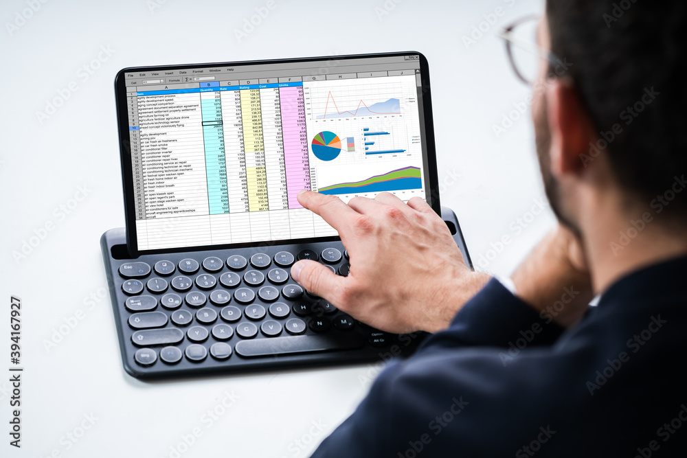 Poster Analyst Using Spreadsheet Report On Tablet