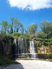 Obraz premium Italian landscape, waterfall, mountains, trees, sky, blue, green