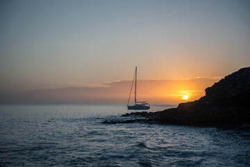 Boat at sunset in the Atlantic Sea on the Island of Fuerteventura in Spain