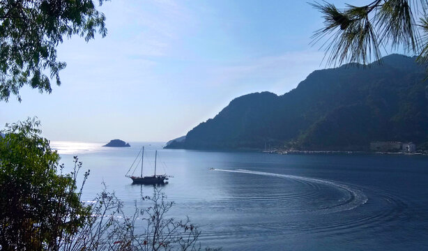 Mountains and the boat from icmeler in Marmaris, Turkey. Mobile photo