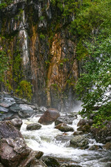 Naklejka na ściany i meble Teletskoye lake, Altai. Chedor waterfall in the wild